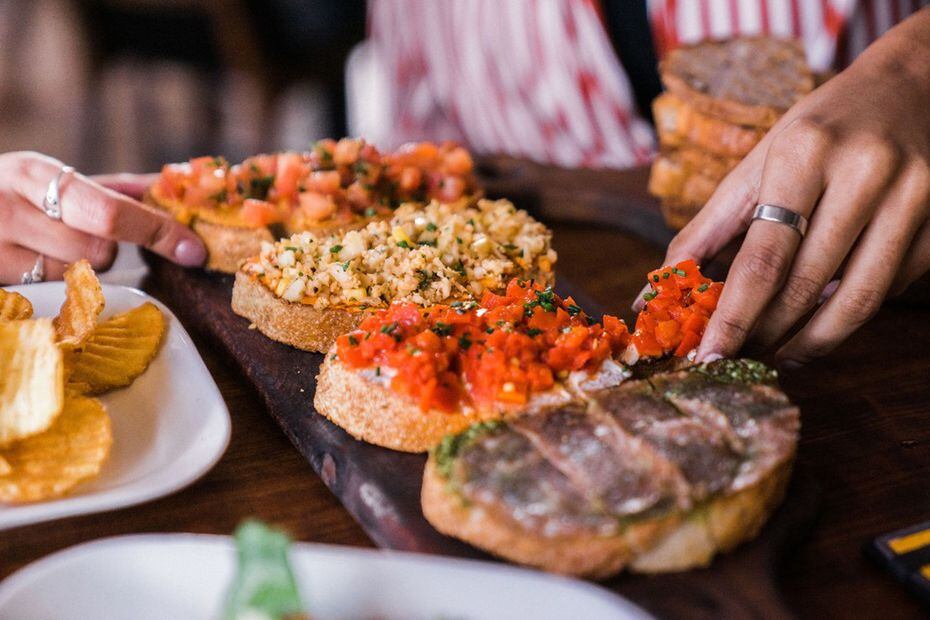 Bruschetta boards at Postino in Deep Ellum are popular at lunchtime. The salads and...
