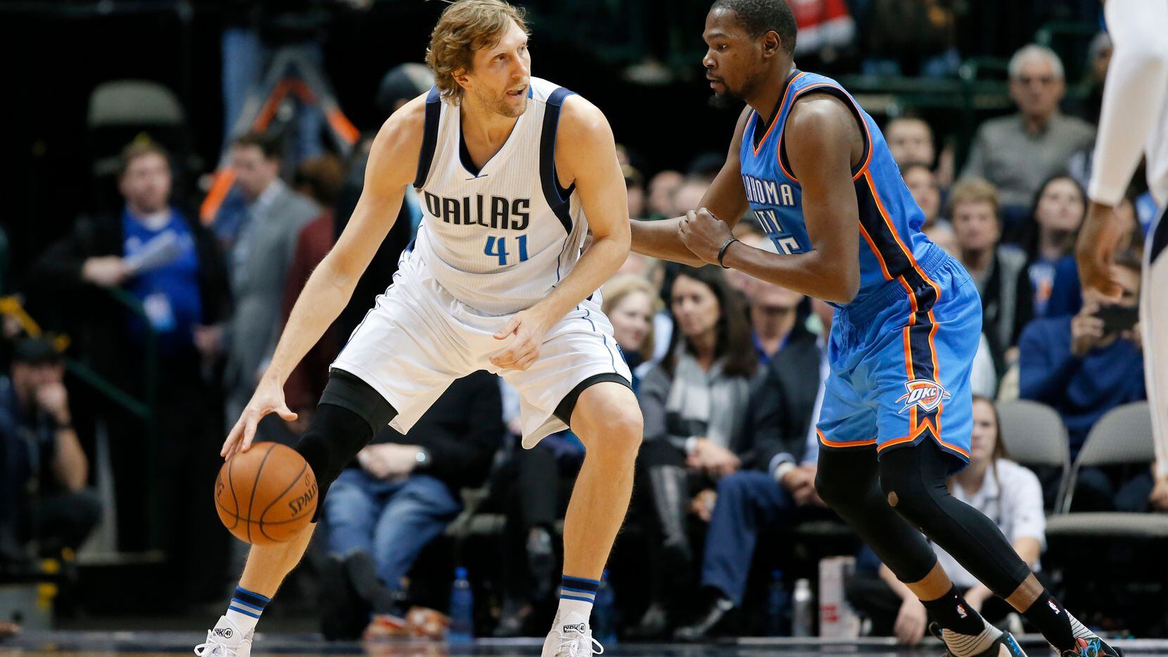 Dallas Mavericks forward Dirk Nowitzki (41) moves the ball to the basket as Oklahoma City...