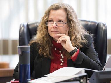 State Board of Education chairwoman Donna Bahorich listens during discussion of keeping...