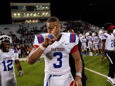 Duncanville quarterback Ja'Quinden Jackson flashes a number 1 after he and his teammates defeated Lancaster, 24-3, at Beverly D. Humphrey Tiger Stadium in Lancaster Texas, Friday, August 30, 2019. (Tom Fox/The Dallas Morning News)