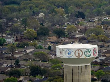 An aerial view of water tower and residential neighborhoods near West Mesquite High School.