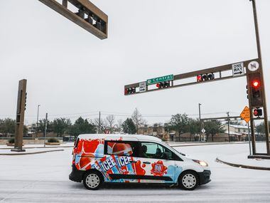 Traffic on N Central Expy as sleet falls over the Dallas metroplex on Tuesday, Jan. 31,...