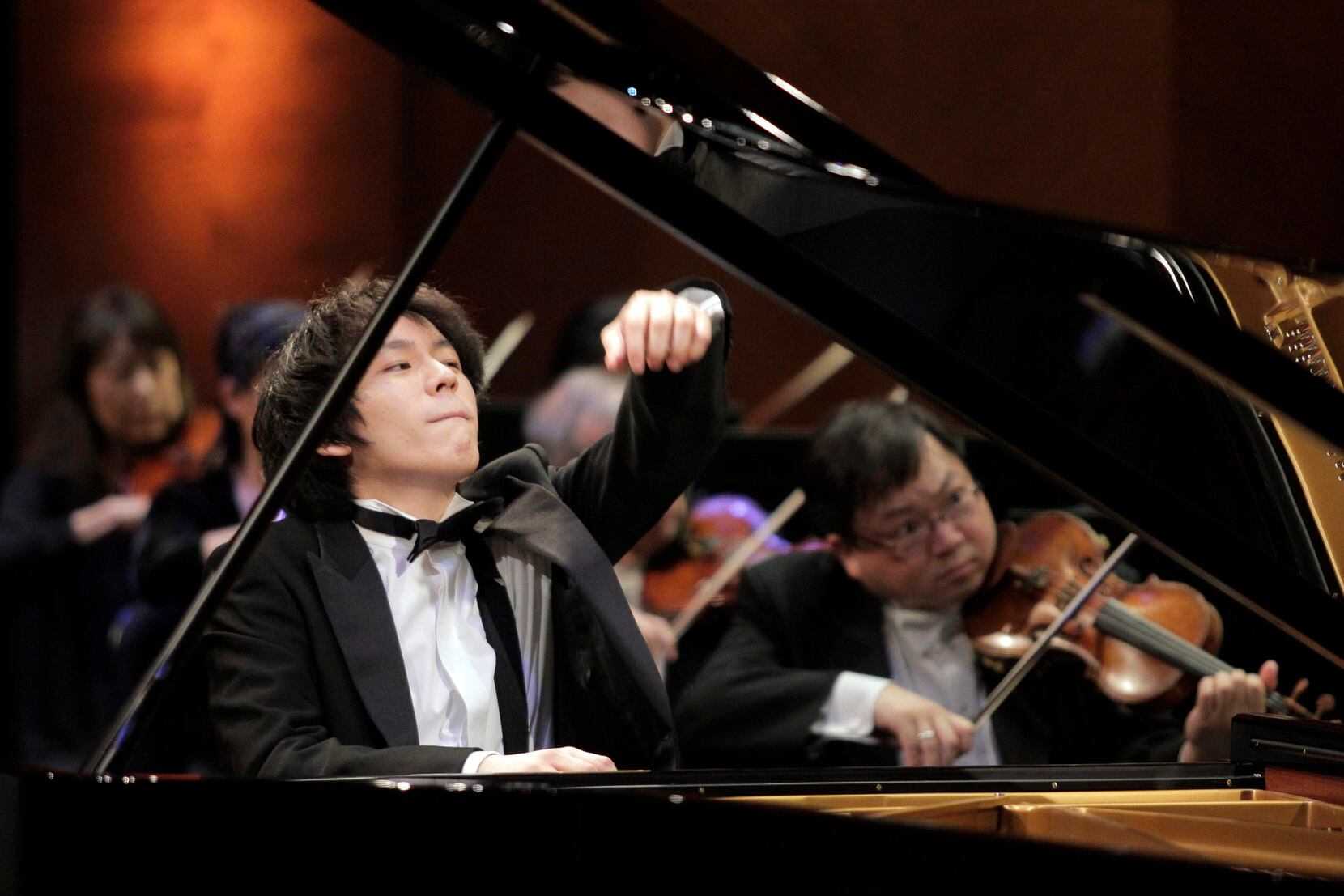 Pianist Masaya Kamei performs with the Fort Worth Symphony Orchestra and guest conductor...