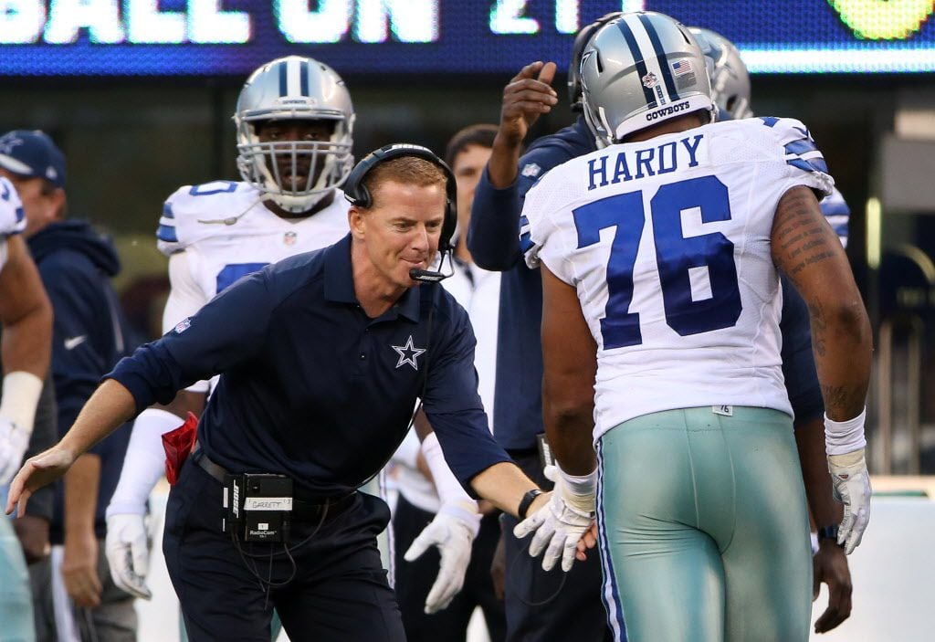 Dallas Cowboys head coach Jason Garrett celebrates with defensive end Greg Hardy (76) after Hardy sacked New York Giants quarterback Eli Manning (10) in the first half during a National Football League game between the Dallas Cowboys and New York Giants at MetLife Stadium in East Rutherford, New Jersey, Sunday October 25, 2015. The Giants beat the Cowboys 27-20. (Andy Jacobsohn/The Dallas Morning News)