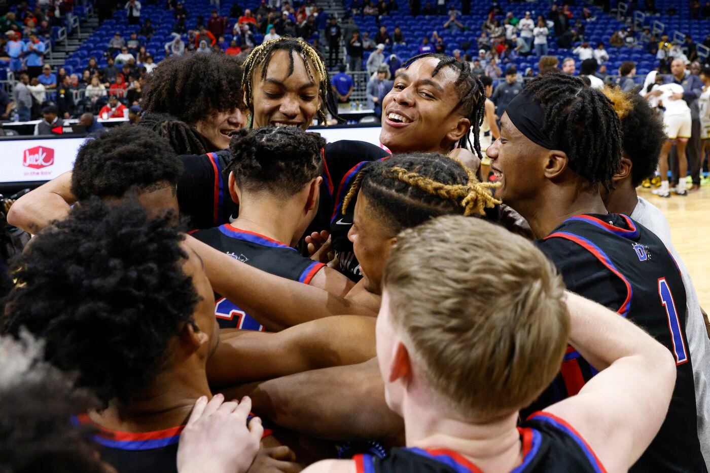 Duncanville players celebrate after winning the Class 6A state championship game at the...