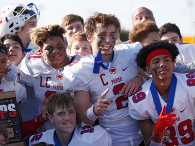 Parish Episcopal's Preston Stone (2) and teammates celebrate their victory over Plano John Paul II after winning 42-14 in the TAPPS Division I State Championship game at Waco Midway's Panther Stadium in Hewitt, Texas on Friday, December 6, 2019. (Vernon Bryant/The Dallas Morning News)