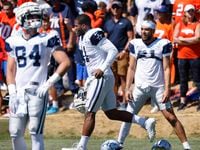 Dallas Cowboys outside linebacker Micah Parsons (11) runs onto he field to prepare for their...