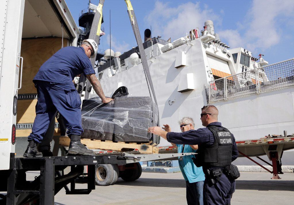 A pallet of cocaine is off-loaded from the 418-foot Coast Guard Cutter Hamilton, Thursday,...