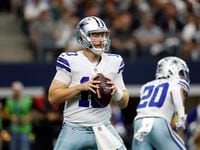 Dallas Cowboys quarterback Cooper Rush (10) looks to pass during an NFL football game...