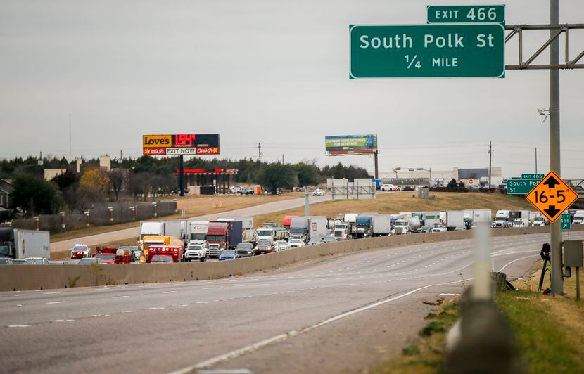 Both directions of traffic on I-20 at I-35E were shut down during a standoff between police...