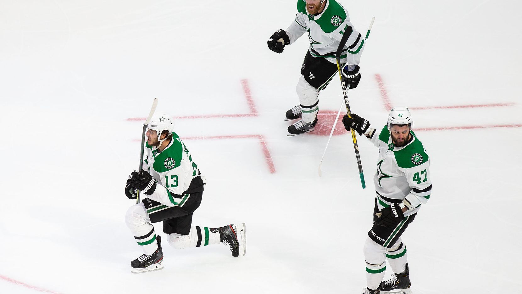 Mattias Janmark (13), Joe Pavelski (16) and Alexander Radulov (47) of the Dallas Stars celebrate Janmark&#39;s goal against the Tampa Bay Lightning during Game Two of the Stanley Cup Final at Rogers Place in Edmonton, Alberta, Canada on Monday, September 21, 2020. (Codie McLachlan/Special Contributor)