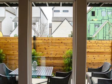 A private patio in a model home at the new Centre Living Homes neighborhood at Sparrow Lane...