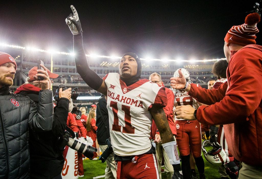 Oklahoma Sooners cornerback Parnell Motley (11) celebrates after a 34-31 win against the...