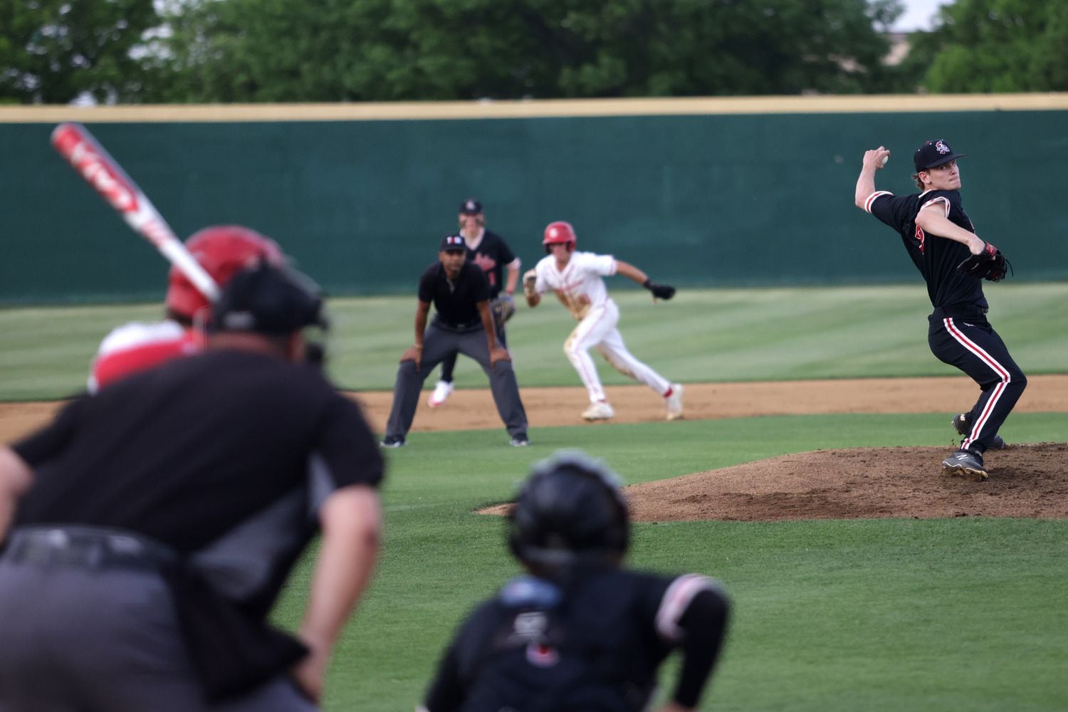 Argyle's Alex D'Angelo pitches during a 5-1 win over Grapevine, the state's top-ranked Class...