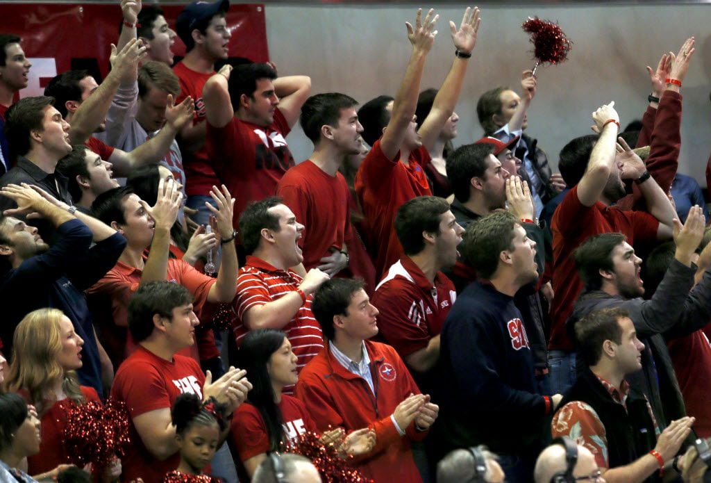 Fans react after SMU scores during the second half of the SMU vs. Connecticut basketball...