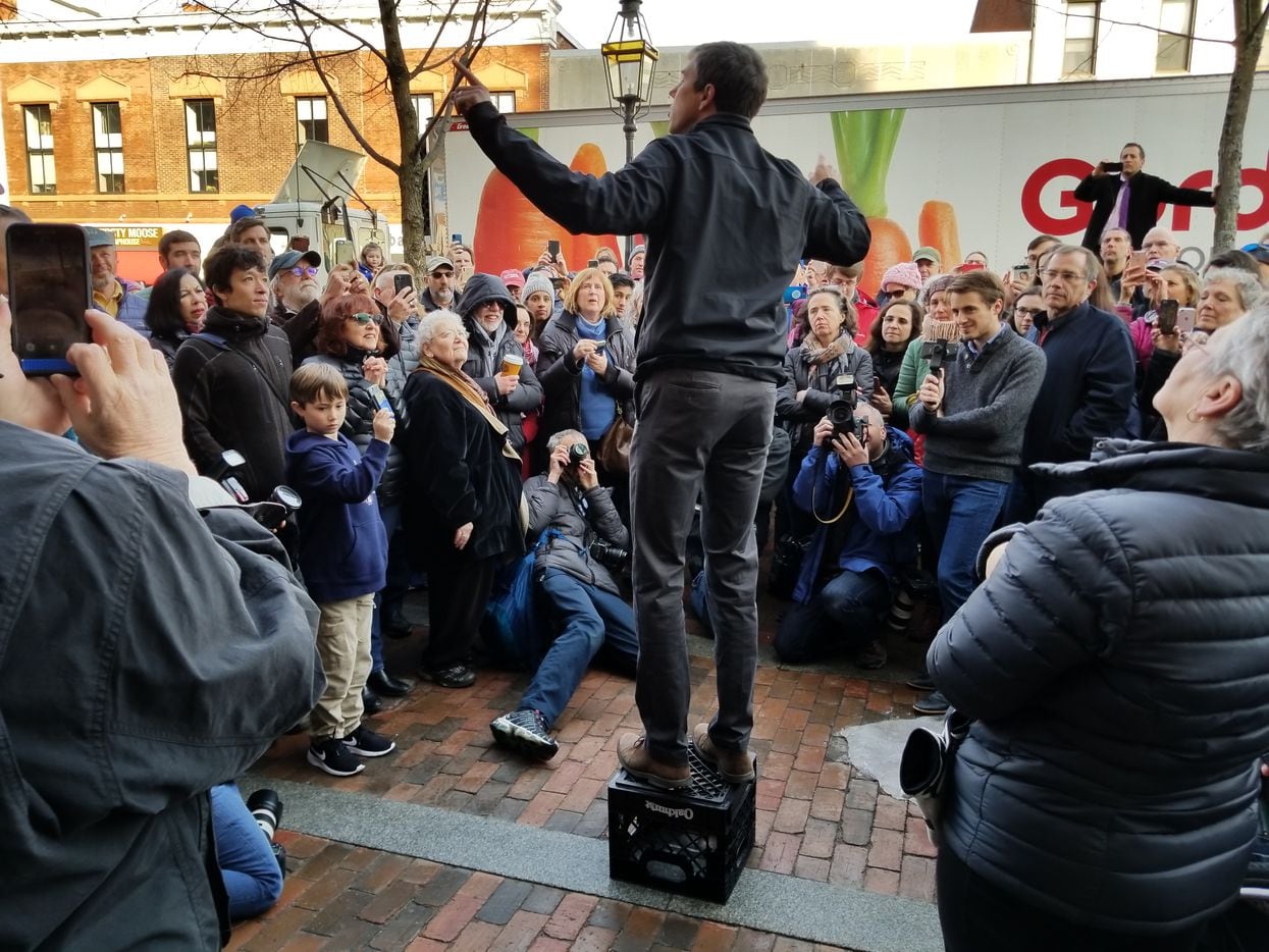 Beto O'Rourke speaks to the overflow crowd Thursday outside Popovers on the Square on in...