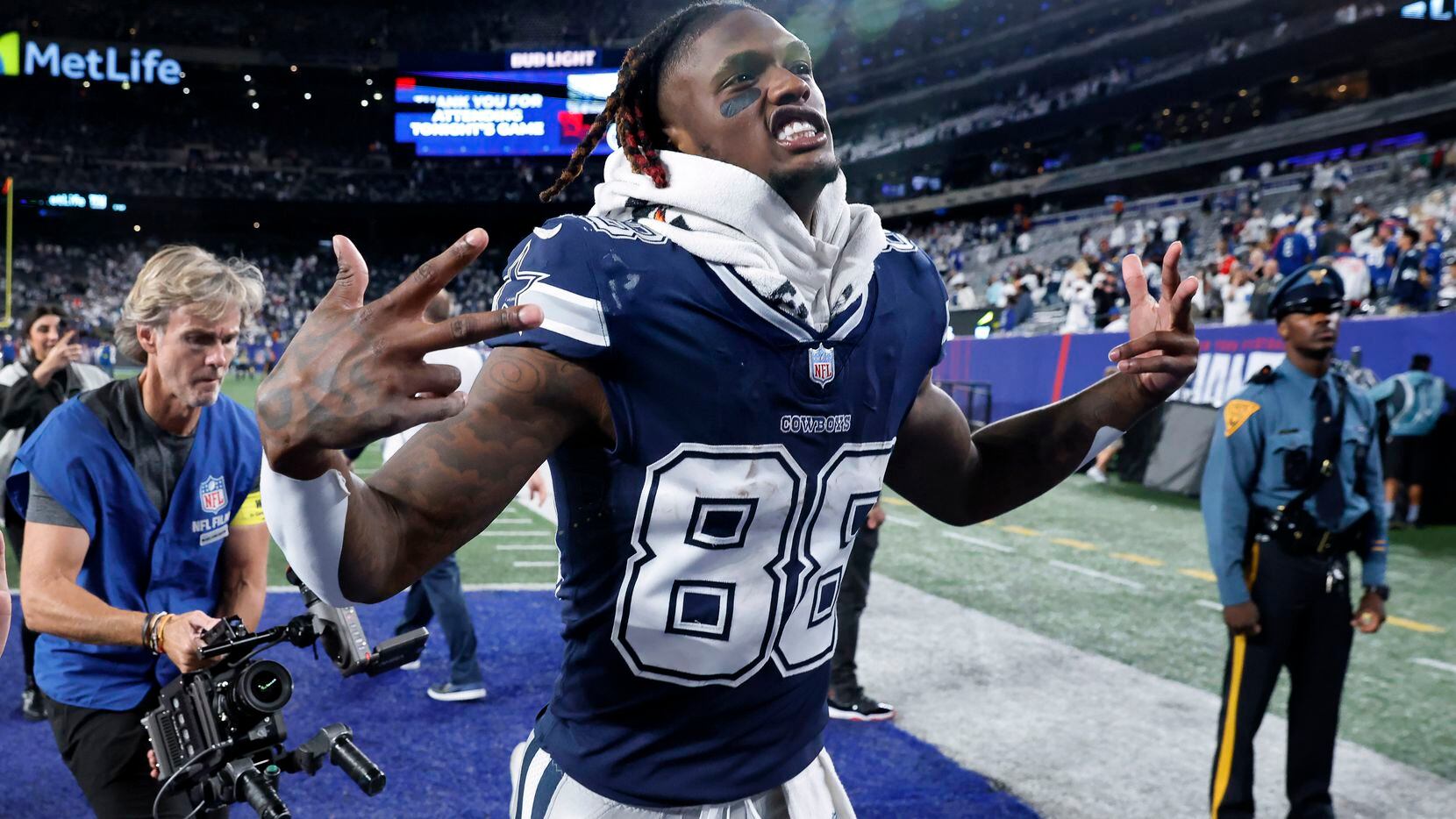 Dallas Cowboys wide receiver CeeDee Lamb (88) celebrates their win over the New York Giants...