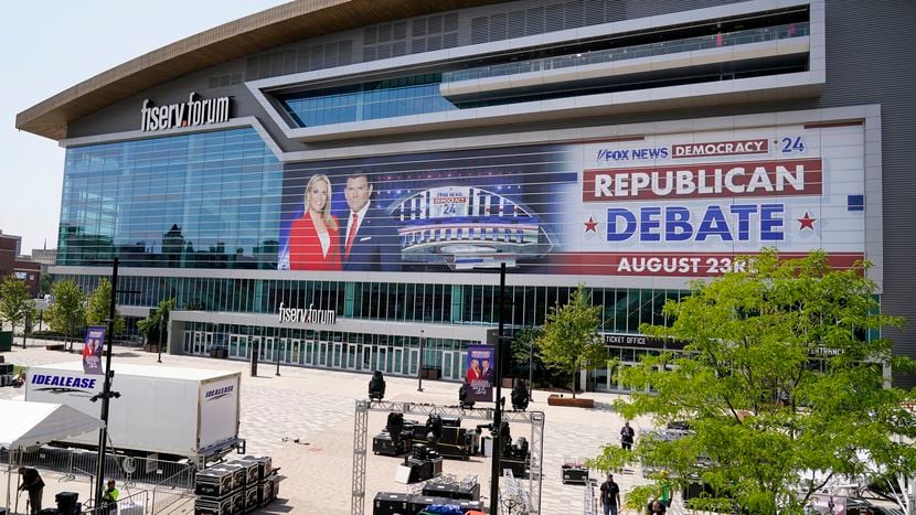 Who are the candidates at the GOP debate in Milwaukee, and what are their backgrounds?