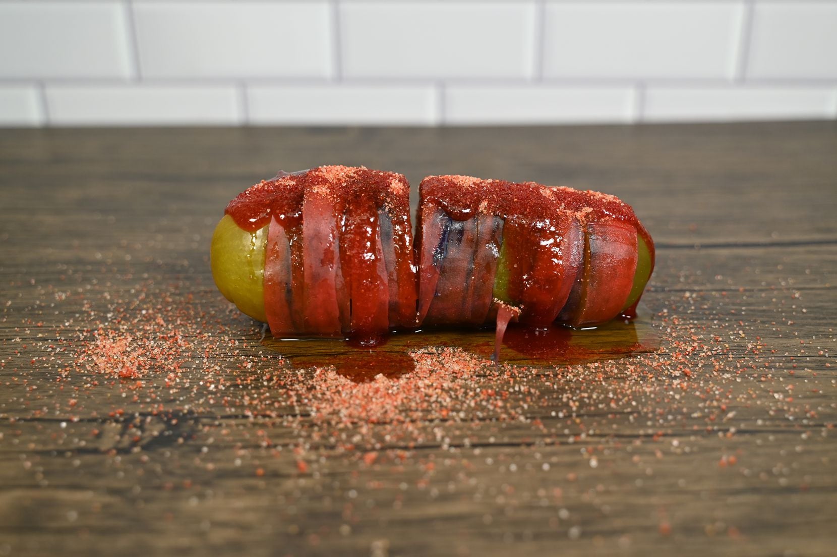 The Chamoy! Pickle at the State Fair of Texas in 2022 is, literally, wrapped and stuffed...