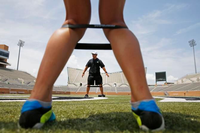 
David Trevino conducted conditioning exercises recently at Apogee Stadium in Denton for the...