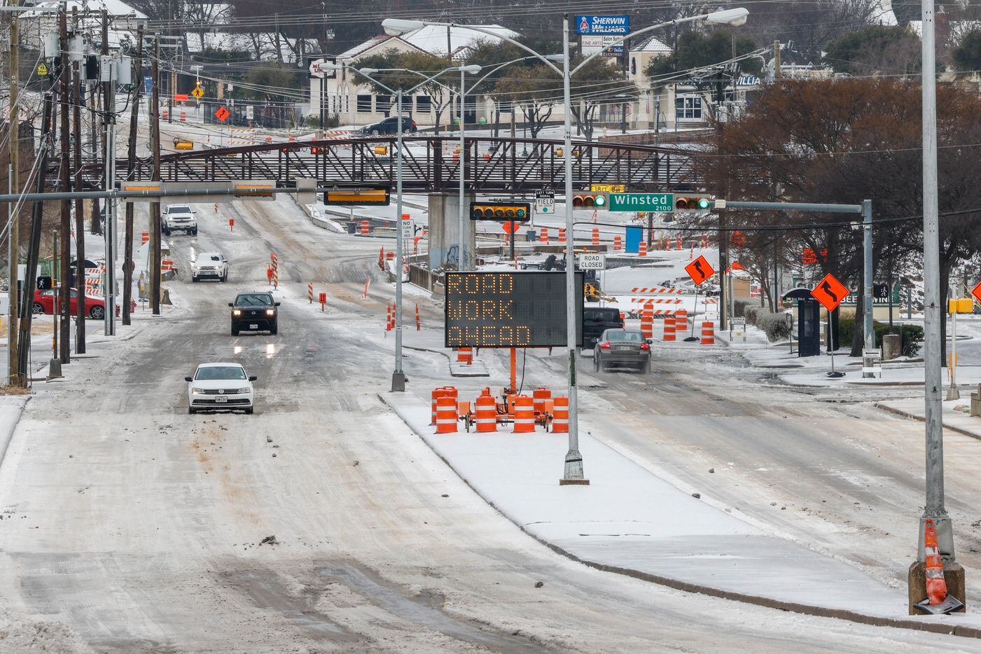 Motorists drive on Garland Rd near White Rock Lake in Dallas on Wednesday, Feb. 1, 2023....