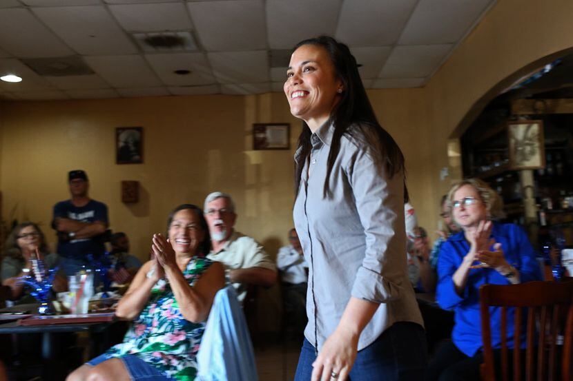 Democratic nominee for Texas' U.S. Congressional District 23 Gina Ortiz Jones smiles as she...