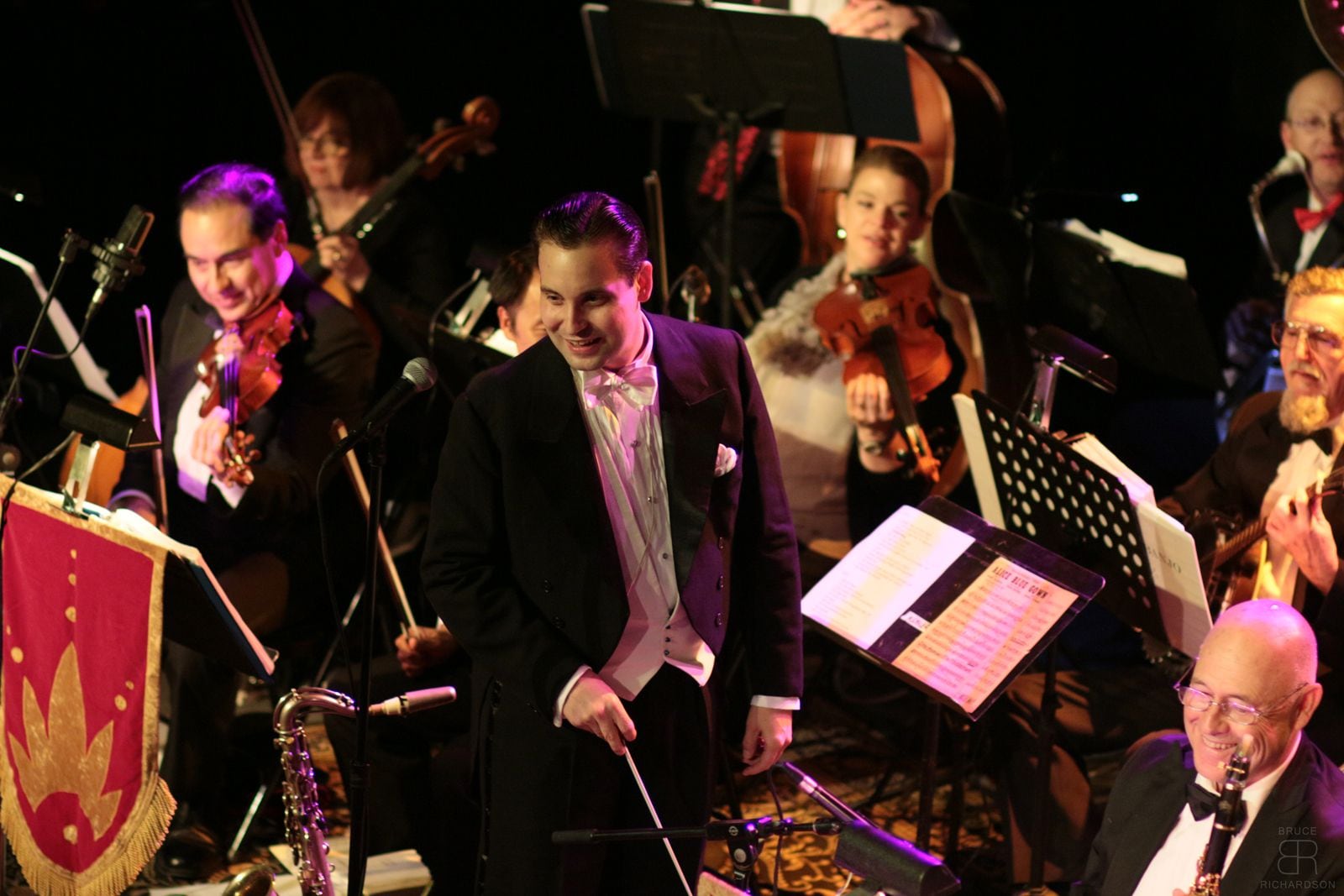 Matt Tolentino directs the Singapore Slingers, an orchestra playing 1920s-30s tunes to fall...