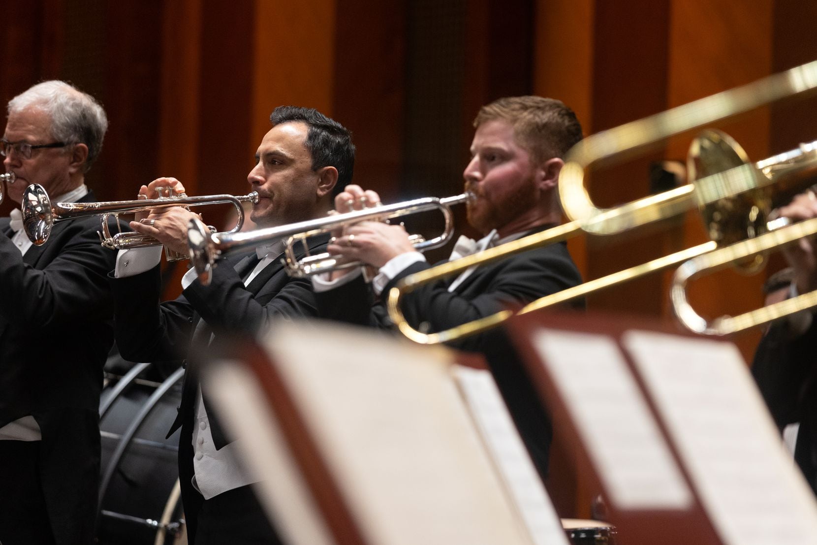 Members of the Fort Worth Symphony Orchestra's brass section perform during a concert at...