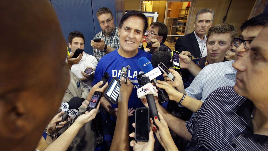 Dallas Mavericks owner Mark Cuban speaks to reporters during an NBA basketball media day in...