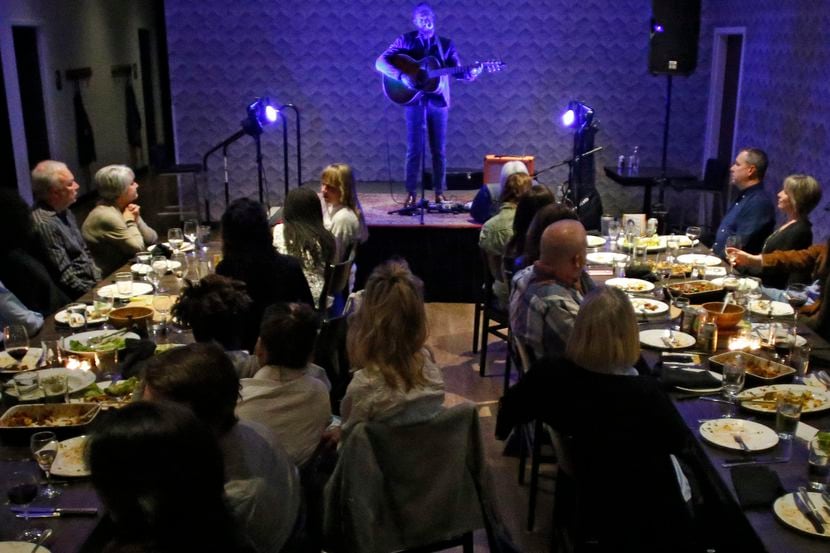 A musician performs during one of Eric Nadel's Sunday Supper Concert Series at Cafe Momentum.