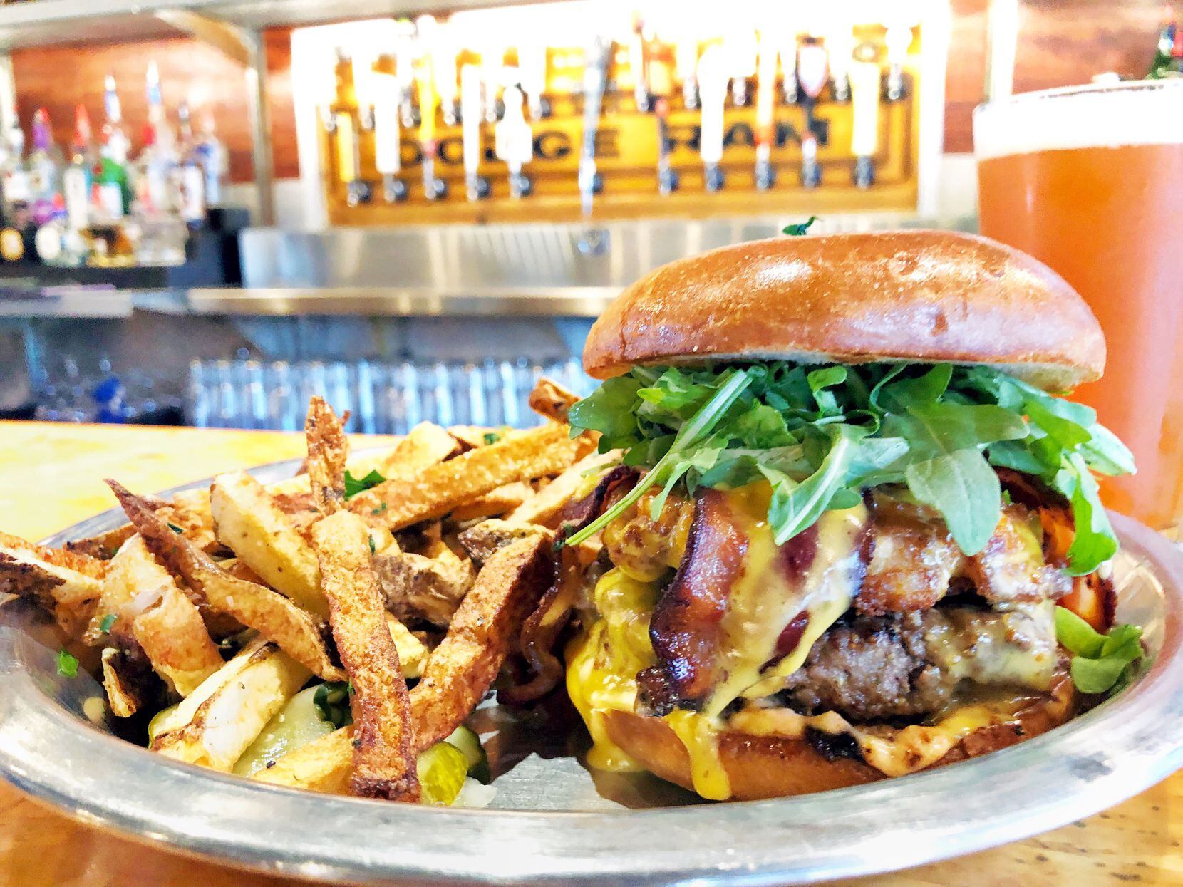 For Father's Day, Rodeo Goat locations will offer the Dad Bod Burger, a beef patty topped with a fried macaroni and cheese patty, bacon, mayo, arugula and pickles drizzled with queso.