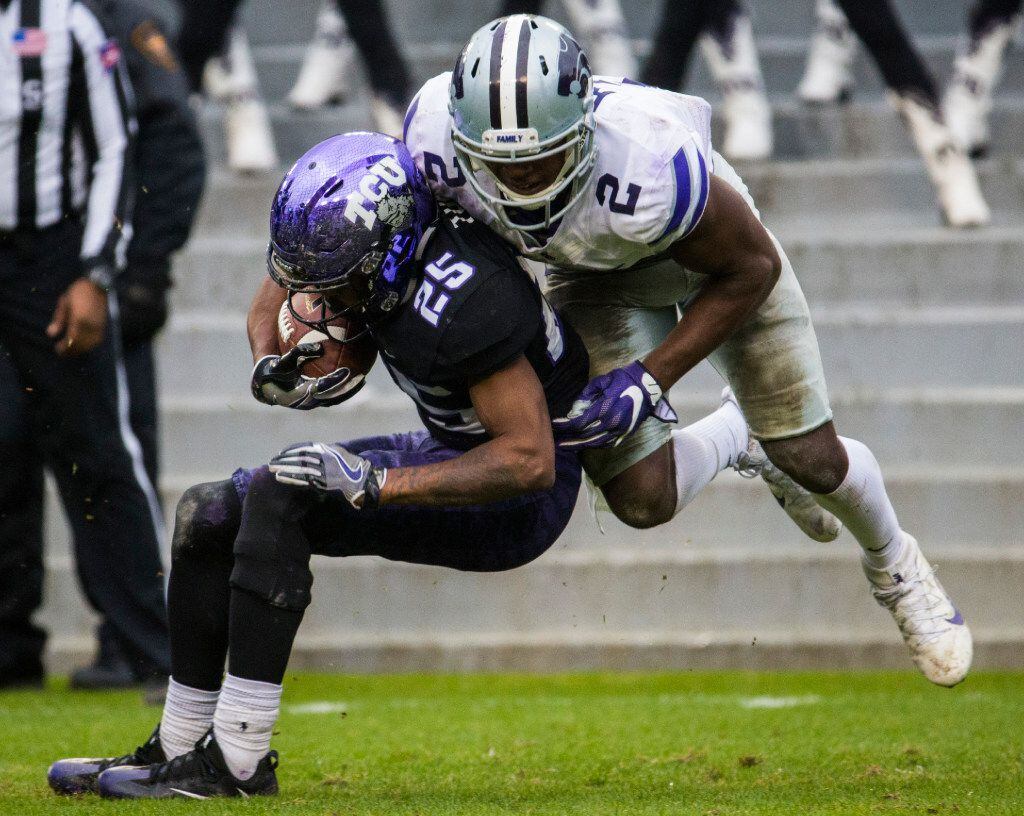 TCU Horned Frogs wide receiver KaVontae Turpin (25) is tackled by Kansas State Wildcats...