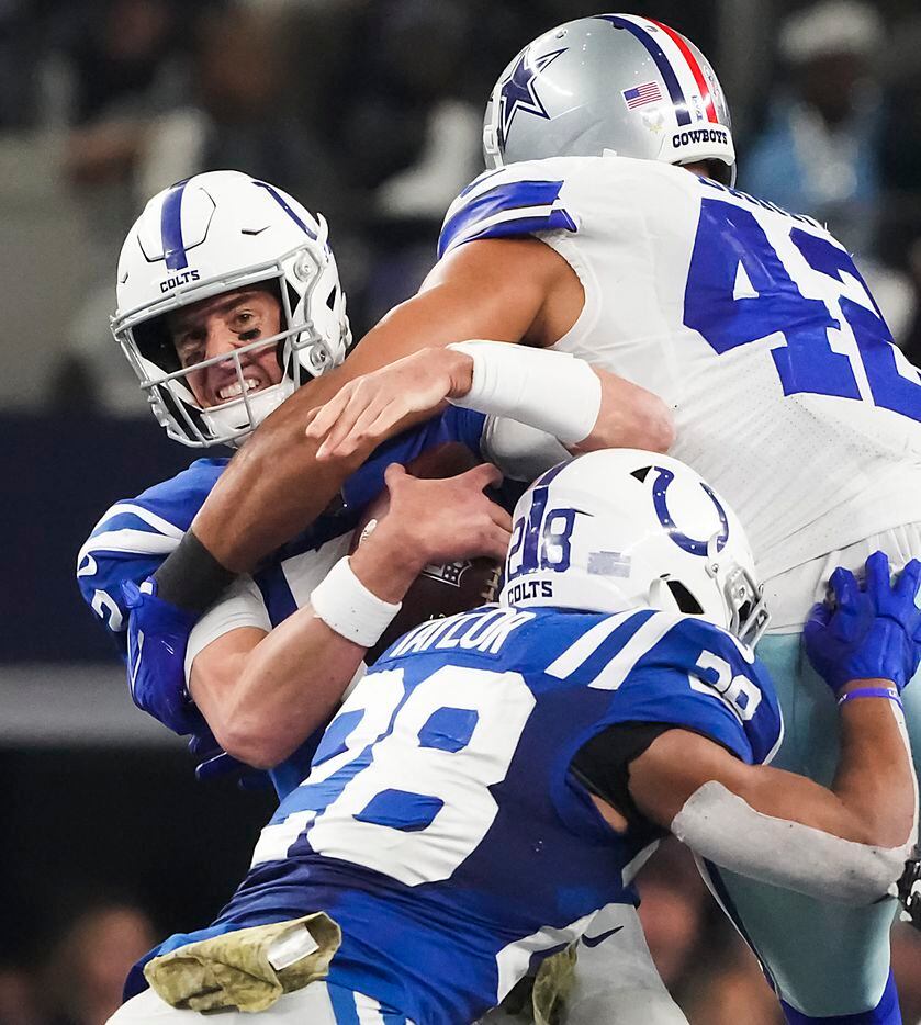 Indianapolis Colts quarterback Matt Ryan (2) is sacked by Dallas Cowboys linebacker Anthony...