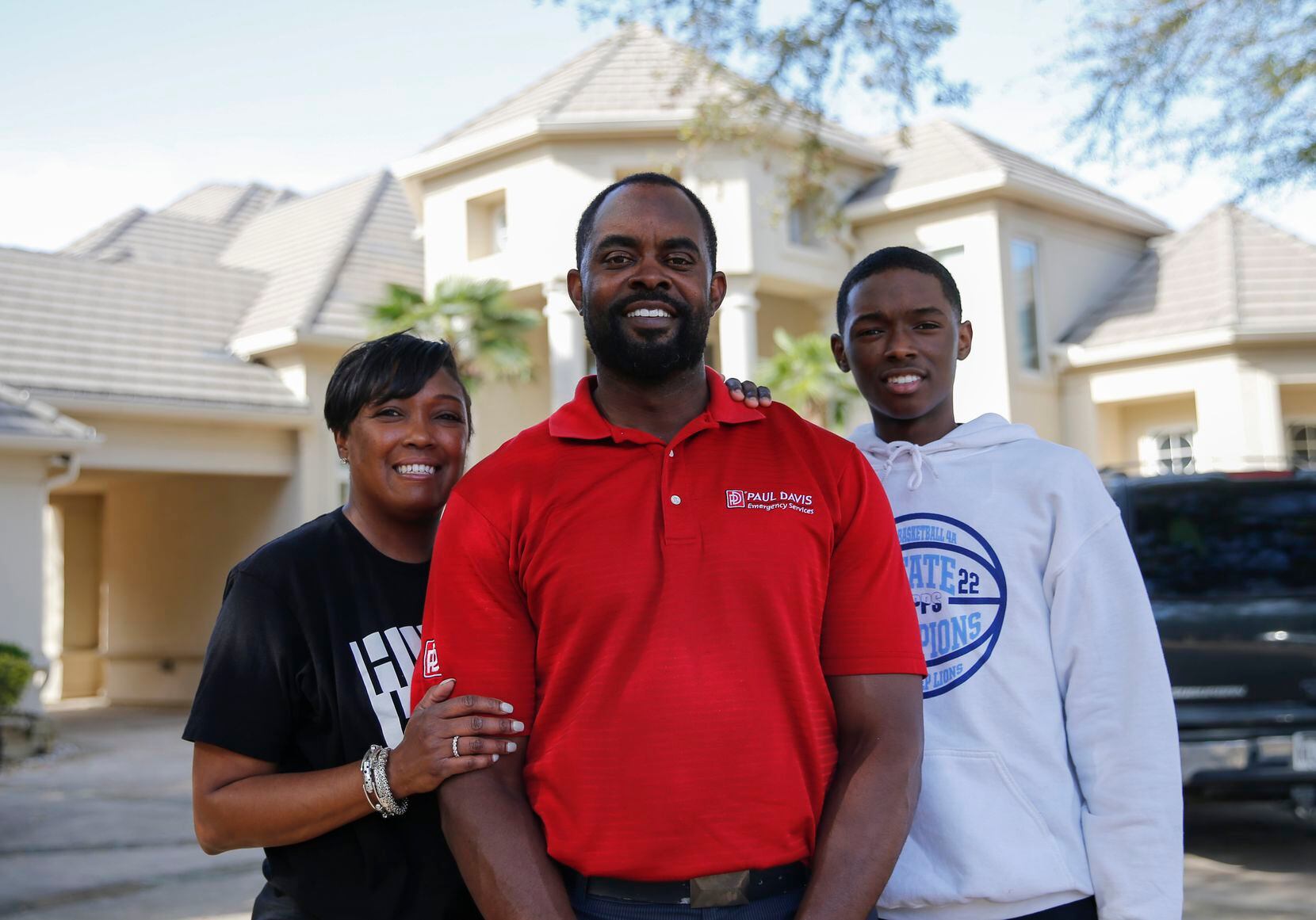 Pele Nunley, wife Vonda and son Bryce toured a home on Henry Court in Arlington on March 28,...