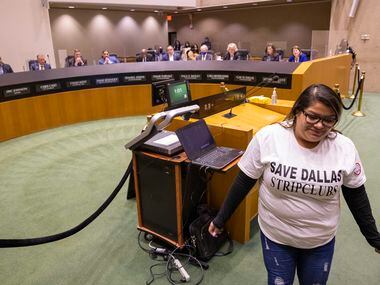 Angelica Batrez steps away from the podium after providing public comment against the...