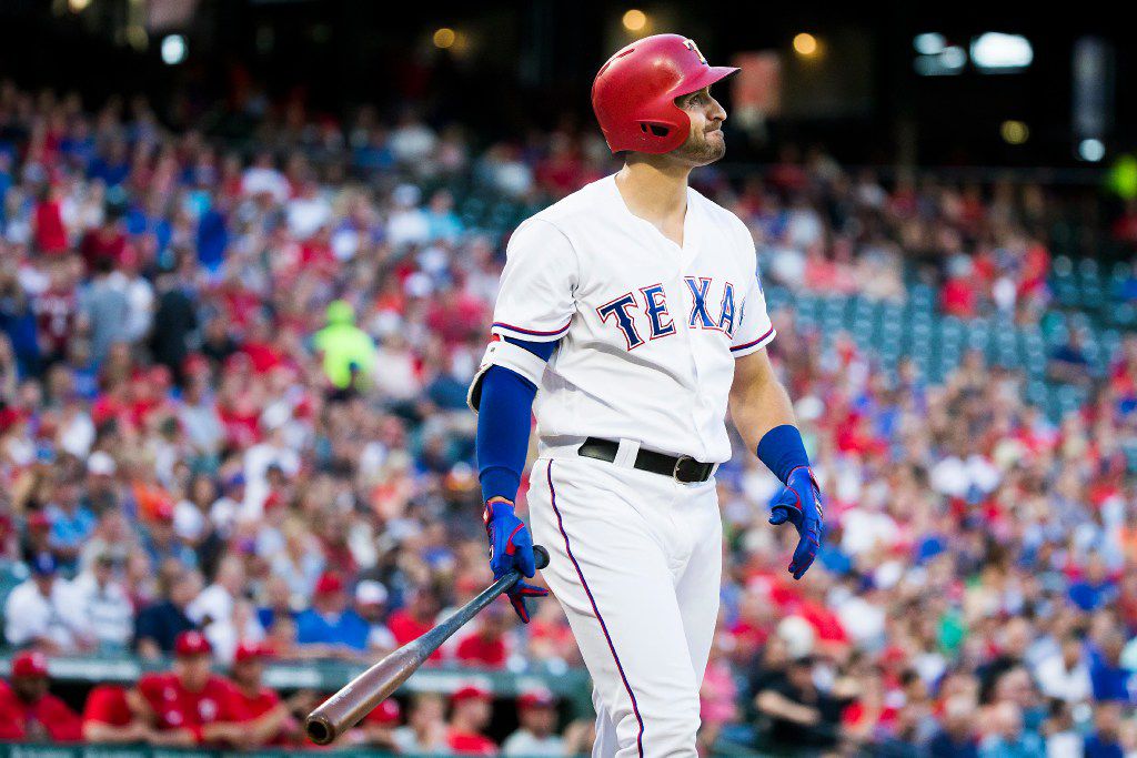Texas Rangers third baseman Joey Gallo reacts after striking out with the bases loaded...