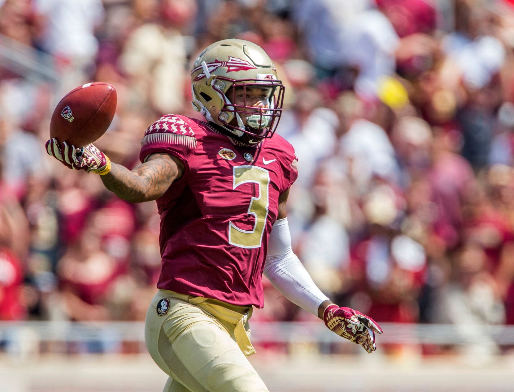 FILE - In this Sept. 23, 2017, file photo, Florida State safety Derwin James celebrates an...
