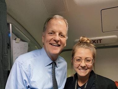 Flight attendant Maddie Peters posed for a photo with American Airlines CEO Doug Parker.