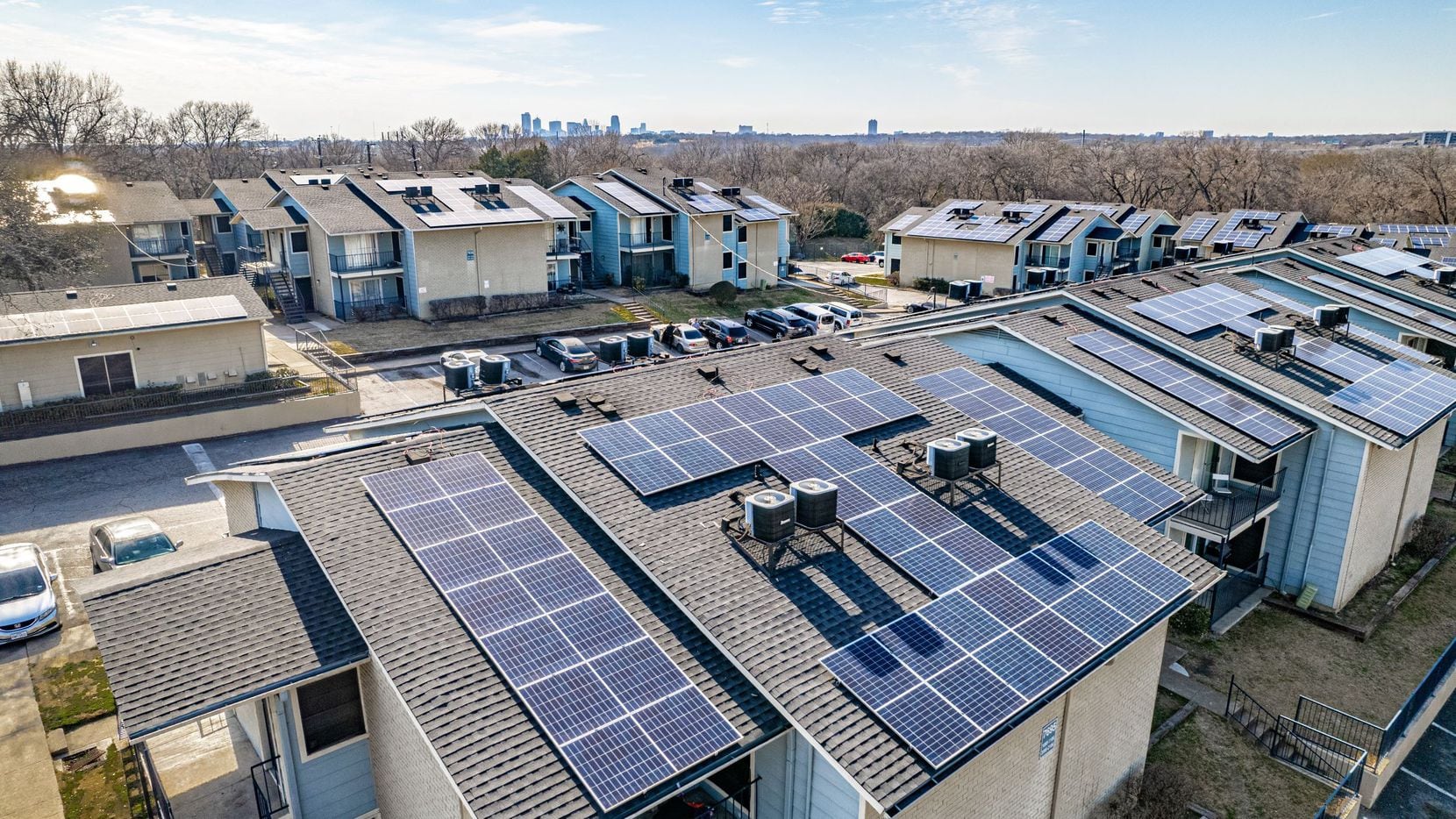 The Solar Company will install solar panels at more than a dozen apartment communities in...
