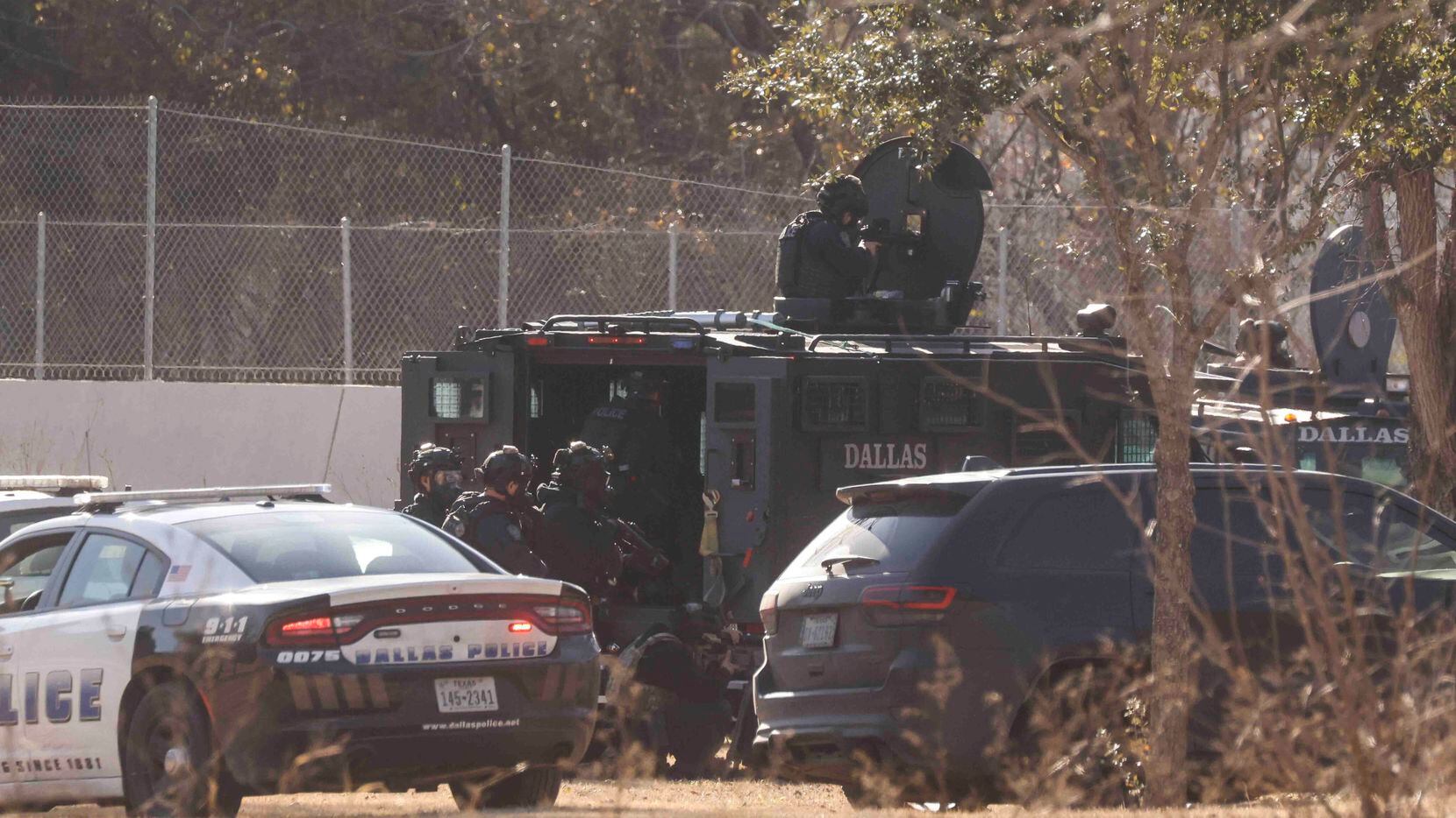 Squad cars, SWAT and Dallas Fire-Rescue respond to an active scene near Keeton Park Golf...