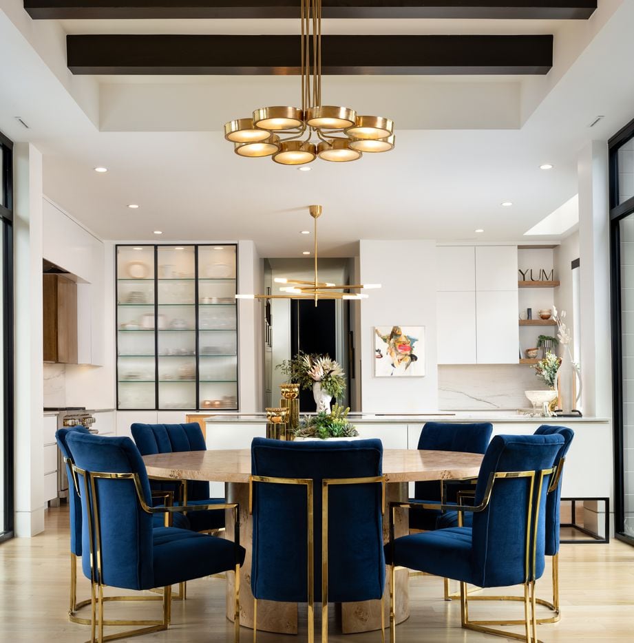 The black and white color palette throughout this Lakewood home is accented by rich colors...