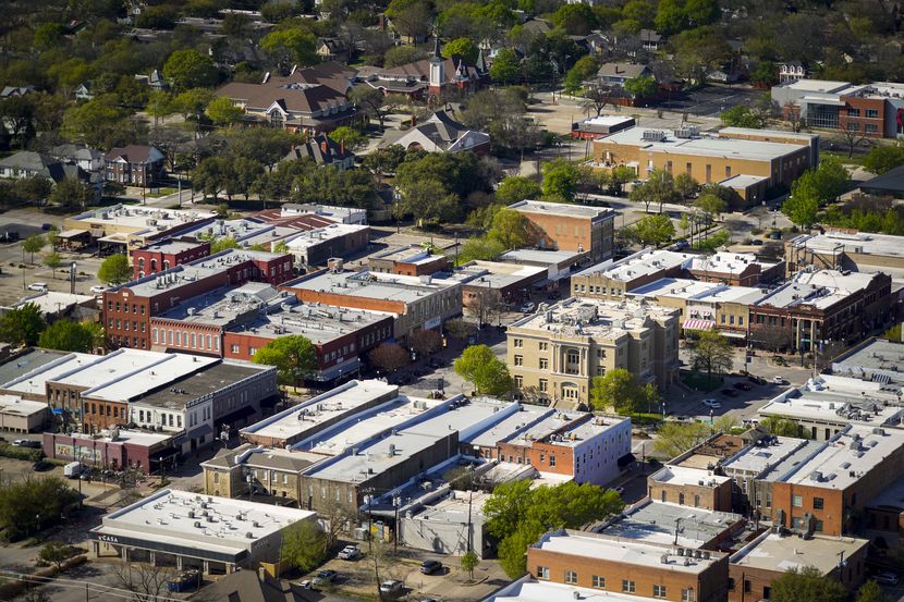 Aerial view of Courthouse Square and historic downtown McKinney on March 24, 2020. Most of...