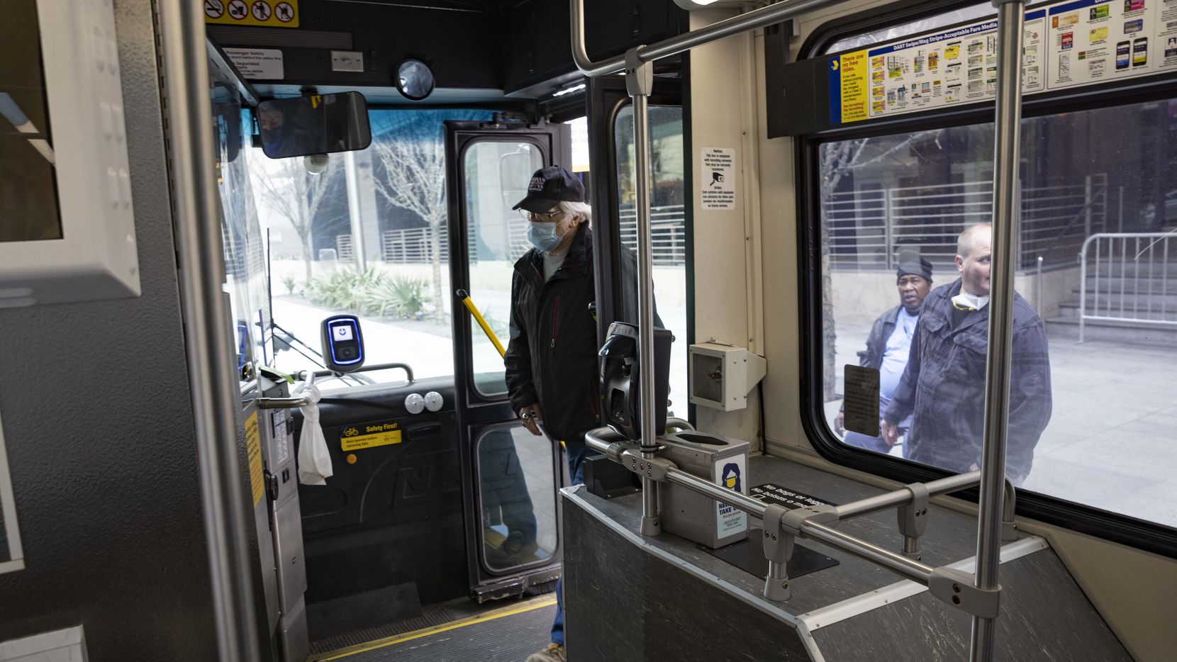 People hop on the DART bus route 16 on Monday, After a bus route redesign, almost every bus...