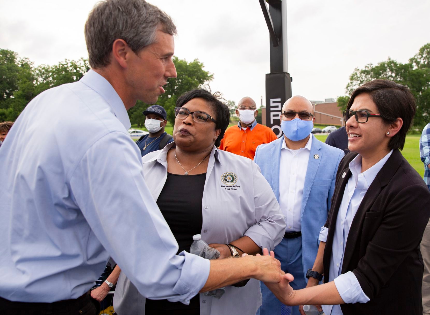 Former congressman Beto O'Rourke shakes state representative Jessica González's hand before his For the People, The Texas Drive for Democracy event on Tuesday, June 8, 2021, at Paul Quinn College in Dallas. (Juan Figueroa/The Dallas Morning News)