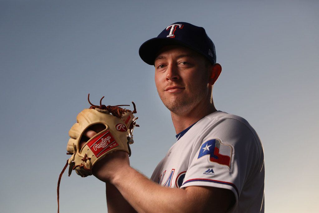 FILE - Texas Rangers pitcher Adrian Sampson poses for a photo during Spring Training picture...