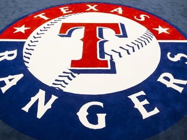 The team logo fills the center of the room in the clubhouse of the Texas Rangers newly renovated spring training facility as seen during a media tour on Thursday, Feb. 18, 2016, in Surprise, Ariz. (Smiley N. Pool/The Dallas Morning News)