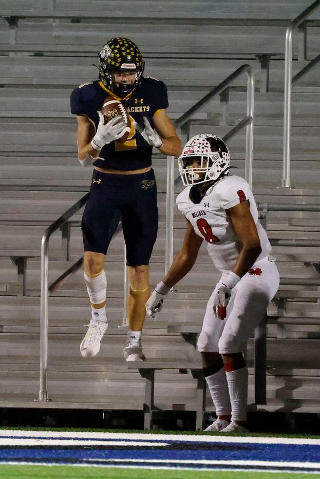 Stephenville wide receiver Coy Eakin (2) celebrates his touchdown reception in front of Melissa’s Jacob Fields (8) during the second half of a Class 4A Division I Region II final high school football game in Bedford, Texas on Friday, Dec. 3, 2021. (Michael Ainsworth/Special Contributor)