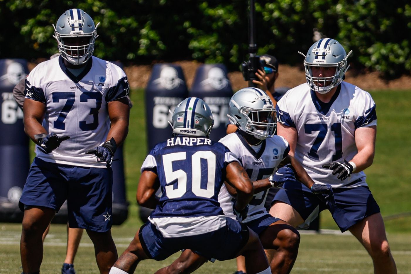 Dallas Cowboys linebacker (50) Devin Harper, offensive tackle (73) Tyler Smith and offensive...