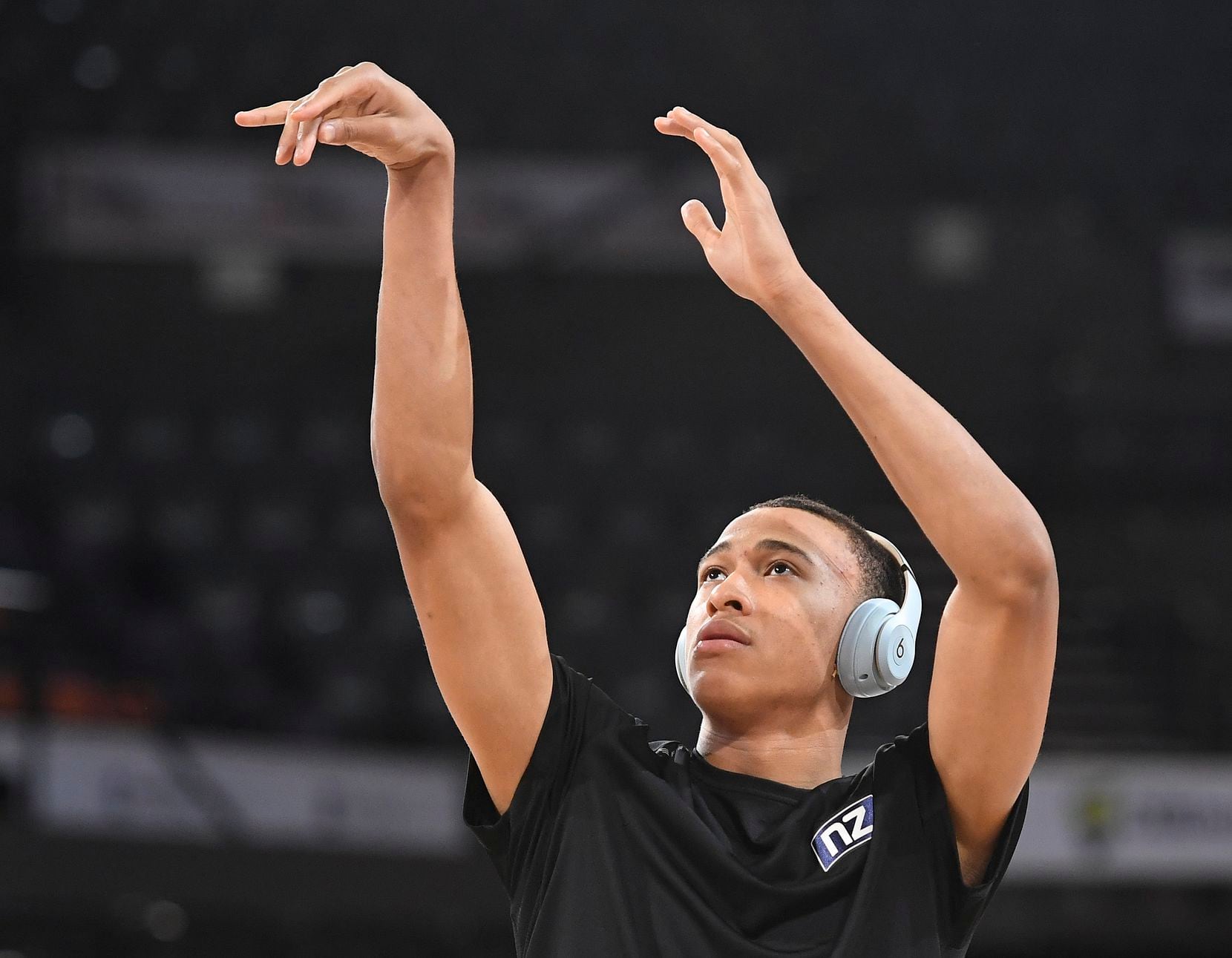 FILE - RJ Hampton of the New Zealand Breakers warms up before the start of a Round 15 NBL...