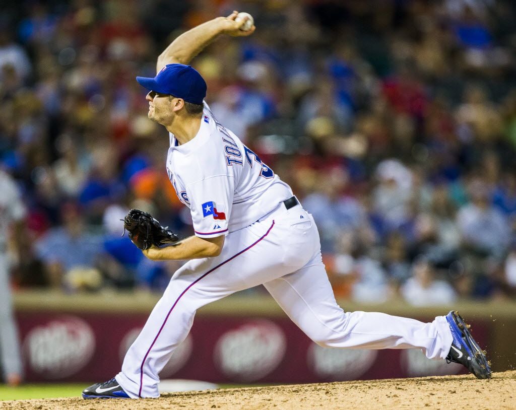 Texas Rangers relief pitcher Shawn Tolleson (37) pitches during the ninth inning of their...